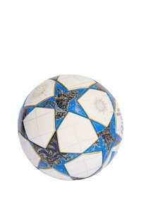 Ballon de football avec des panneaux en forme d'étoile blancs bordés d'or, présentant des illustrations d'animaux et des motifs célestes sur fond bleu.