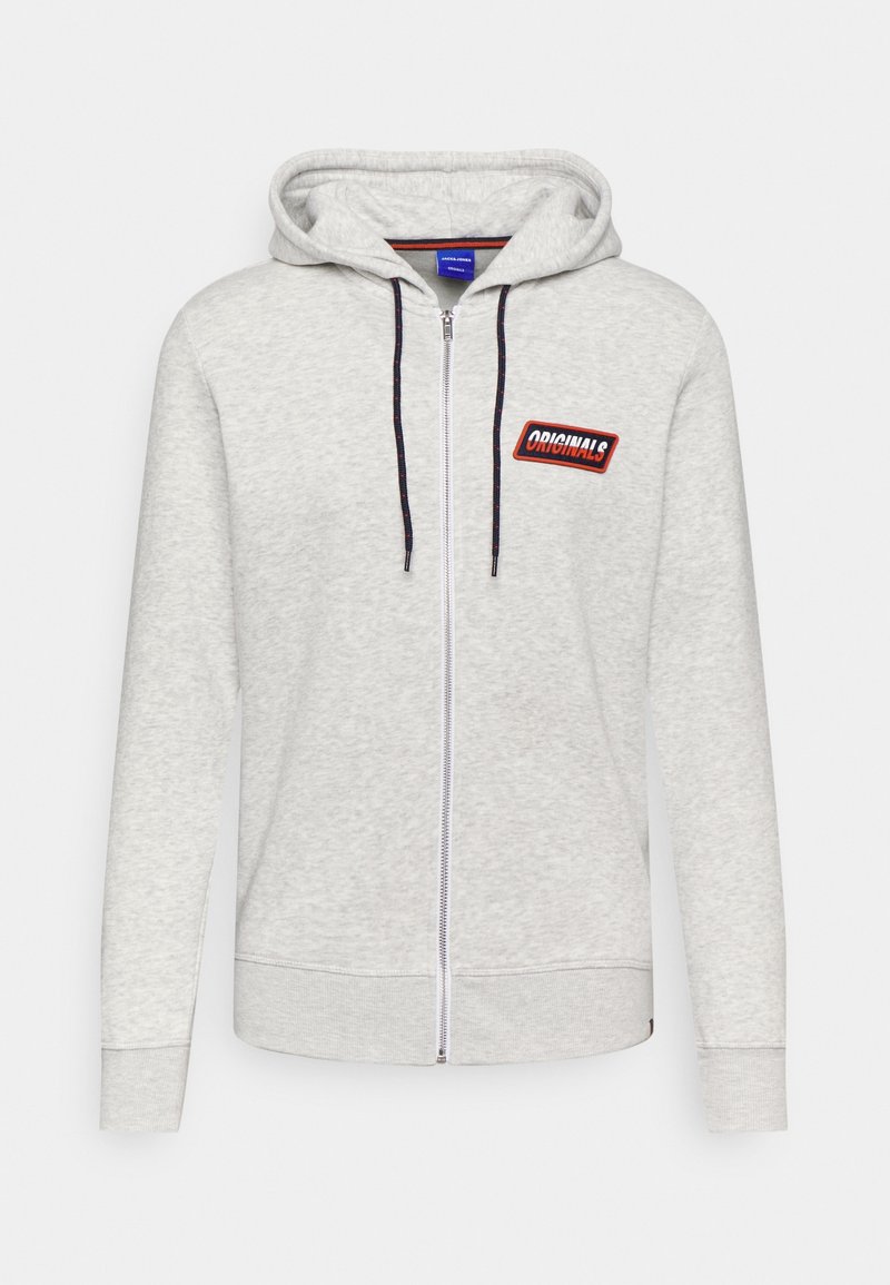 Felpa zip con cappuccio grigio chiaro, tessuto testurizzato, patch rosso e nero "ORIGINALS" e lacci a contrasto. Maniche lunghe con polsini a costine.