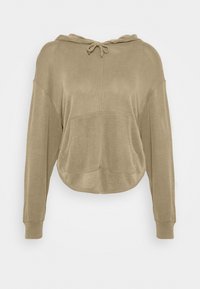 Kraftig hoodie i beige tyg, med dragsko i huvan, framficka och långa ärmar med en avslappnad passform och mjuk textur.