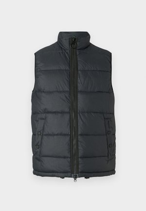 Dark gray padded vest with high collar, full front zipper, and snap-button pockets. Soft texture and stitched detailing throughout.