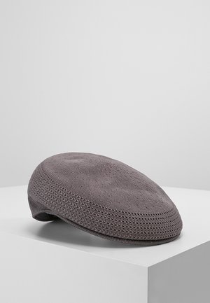 Gray knit cap with a textured pattern and rounded shape. Features a breathable, mesh-like material, creating a lightweight design.