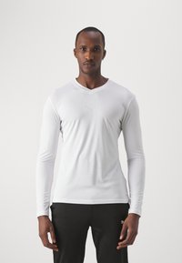 Puma - TEAMGOAL BASELAYER TEE - Apakškrekls - white/feather gray Miniatūras attēls 1