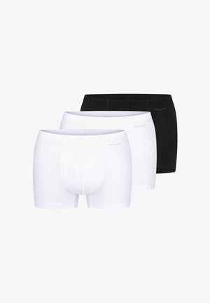Tre herre boxer briefs i sort og hvid, stablet med to hvide par foran og et sort par bagved.