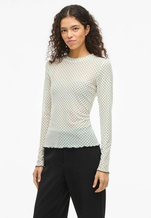 - Bluzka z długim rękawem