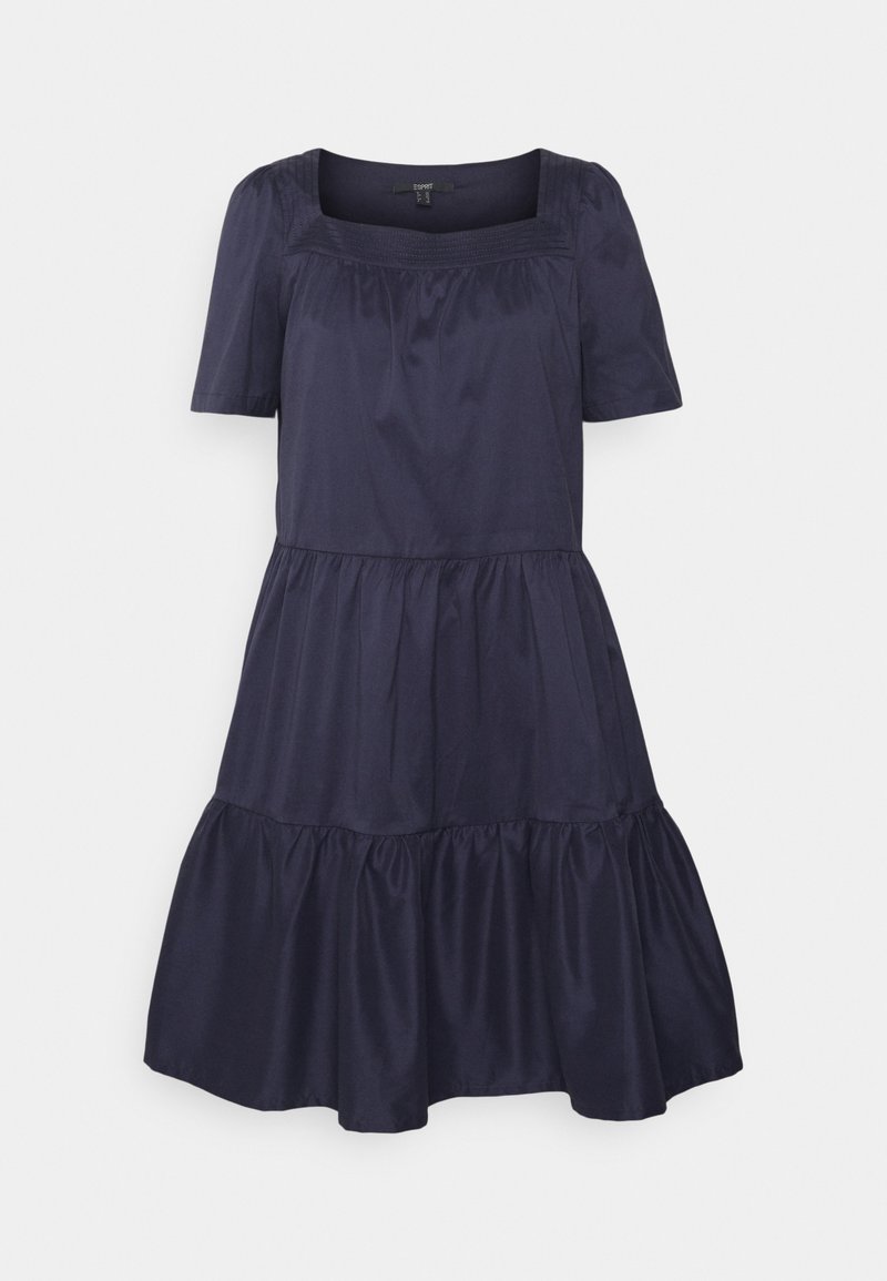 Vestido azul-marinho feito de tecido liso, com mangas curtas, decote quadrado e bainha em camadas com babados.