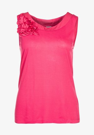 Ærmeløs top i lyserødt stof med en blød, glat tekstur. Har blomsterdetaljer på venstre skulder og en rund udskæring.