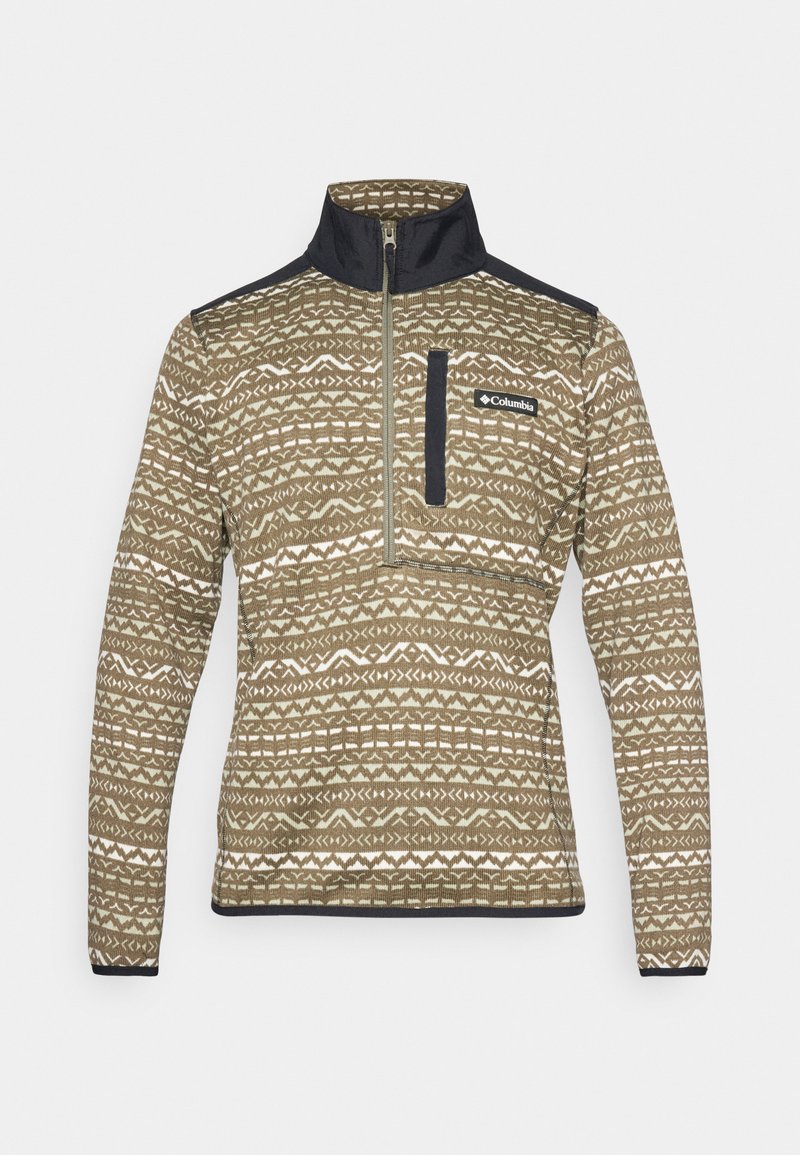 Pólder marrón con cremallera y un patrón geométrico en crema, que presenta un cuello alto y acentos en azul marino en los hombros y el bolsillo del pecho.