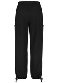 Schwarze elastische Hose mit Kordelzug an den Bündchen, ausgestattet mit zwei Seitentaschen, aus glattem Stoff mit lockerer Passform und geradem Bein-Design.