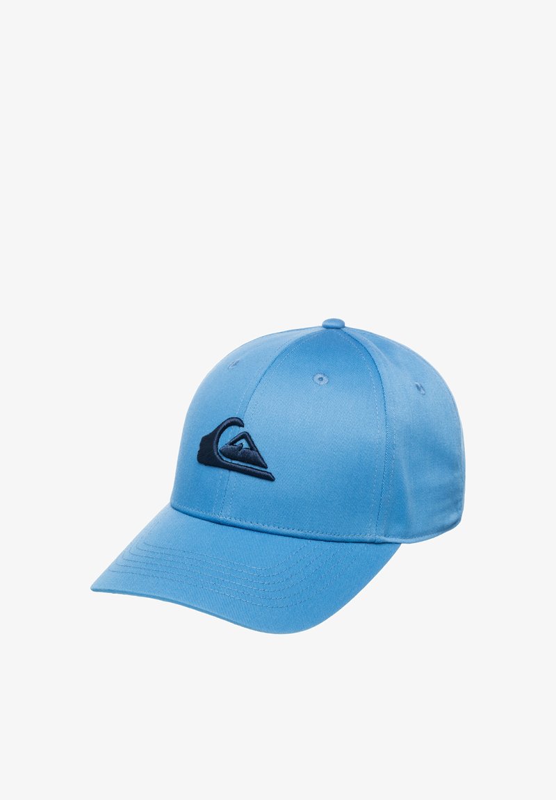 Blue cap made of fabric with a curved brim, featuring a dark blue logo on the front and stitching details along the brim.
