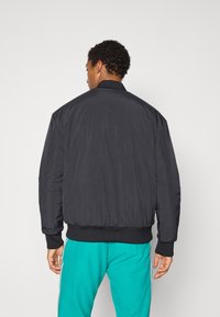 adidas Originals LIVERPOOL FC ICON JACKET - Klubbkläder - black/sea green