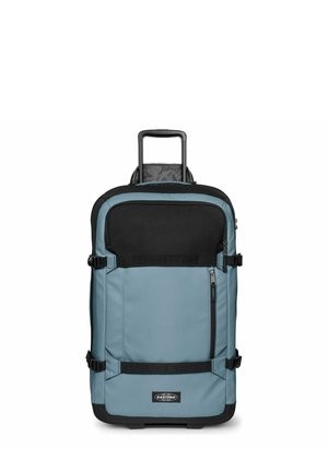 Blau-schwarze Reisetasche mit Rollen, ausziehbarem Griff, Fronttasche mit Reißverschluss, seitlichen Kompressionsriemen und Eastpak-Logo auf der unteren Vorderseite.