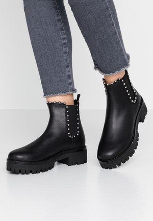Platform ankle boots - black