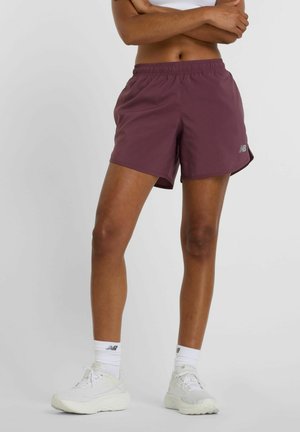 Maroon athletic shorts with an elastic waistband, made of lightweight fabric, featuring a subtle logo accent on the lower right side.