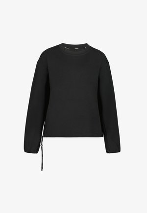 Musta pitkähihaisella pyöreällä pääntiellä varustettu paita, jossa vasemman sivun helmassa on kiristysnauha.