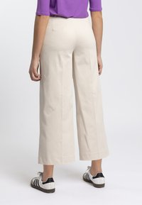 RAGNO SATIN POER - Pantaloni - beige