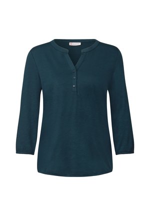 Top bleu-vert à manches longues avec un col en V et une patte de boutonnage à quatre boutons, doté de manches 3/4 et d'une coupe décontractée. Tissu doux et texturé.