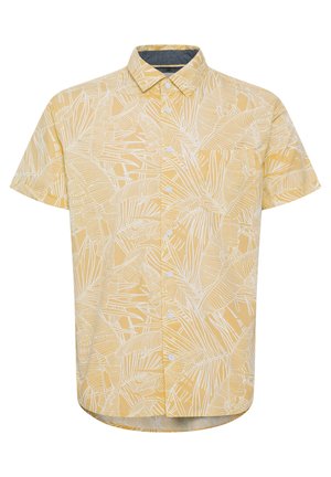 Trumpas rankovėmis marškinis geltonos spalvos audiniu, su baltu palmių lapų raštu, taškine apykakle ir mygtukų užsegimu.