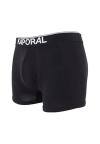 Boxer en noir fabriqué à partir d'un tissu lisse avec un logo "KAPORAL" blanc sur la ceinture élastique. Présente un design ajusté.