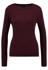 Bordeaux langesweater van een fijne cashmereblend, met een ronde hals en geribbelde zoom. Soepele textuur, aansluitend ontwerp.