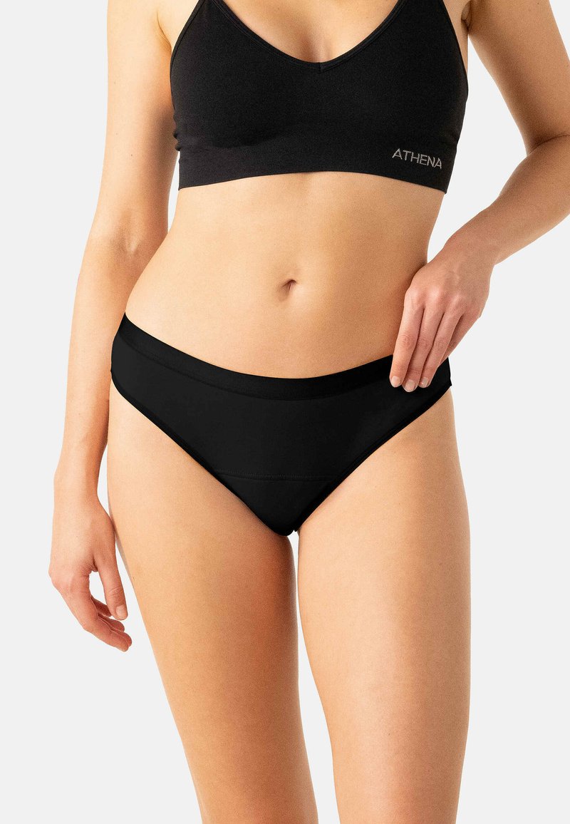 Bas de bikini noir à texture lisse, large bande à la taille et coupe classique style slip. Design simple sans motifs ni éléments métalliques visibles.