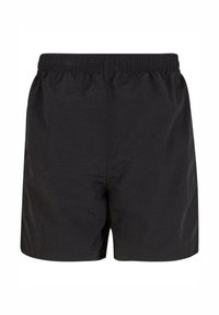 Shorts noirs avec une taille élastique, en tissu léger et texturé, et avec une coupe décontractée. Aucun poches ou détails supplémentaires visibles.
