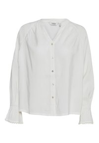 Camicia bianca con bottoni, scollatura a V, maniche lunghe con polsini arricciati e bordo in pizzo decorativo. Realizzata in tessuto leggero.