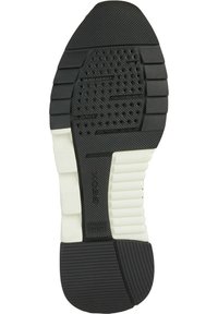 Suola di scarpa in gomma nera con motivi testurizzati, caratterizzata da scanalature e fori per aderenza e flessibilità. Sezione intermedia in bianco a contrasto.