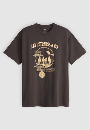 Black cotton t-shirt with short sleeves, featuring vintage-style white and yellow graphic print, including "Levi Strauss & Co" text and imagery.