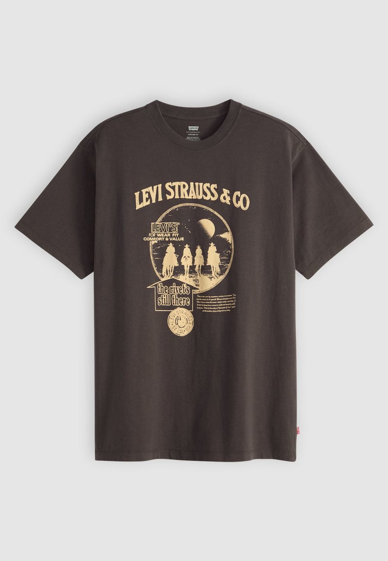 Schwarzes Baumwoll-T-Shirt mit kurzen Ärmeln, das einen grafischen Druck im Vintage-Stil in Weiß und Gelb bietet, einschließlich des Textes "Levi Strauss & Co" und Bildern.