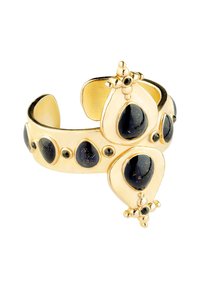 Bracelet en métal doré avec des pierres noires en forme de goutte et des accents décoratifs. Fini lisse avec une texture polie et un design géométrique.