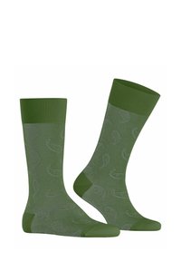 Zielone skarpetki z teksturalnym wzorem jasnych zielonych papryczek chili. Żebrowany ściągacz u góry oraz jednolite zielone akcenty na palcach i pięcie.
