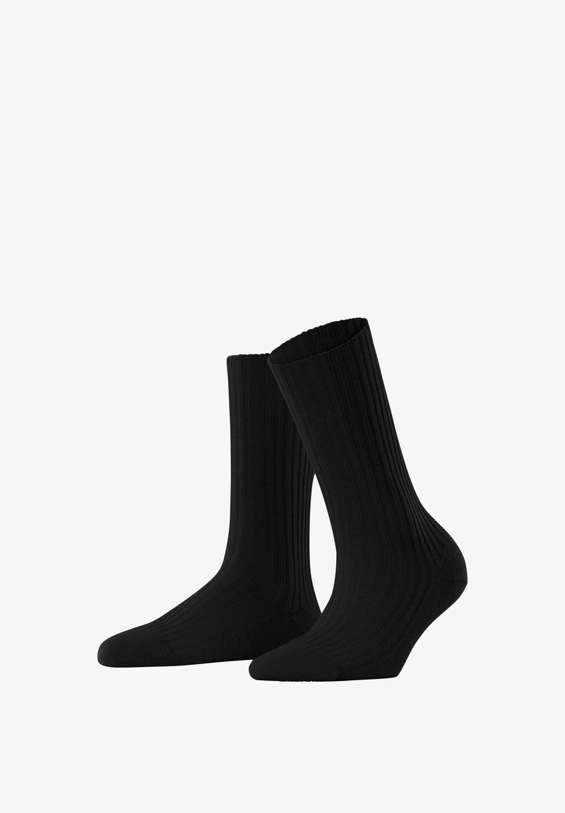 Black ribbed socks with a mid-calf length, featuring a smooth texture and reinforced toe for durability.