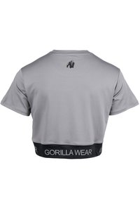 Grijze cropped t-shirt met korte mouwen, voorzien van een zwarte tailleband met het label "GORILLA WEAR" en een klein gorilla-logo op de achterkant.