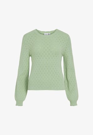 Lys grønn strikket genser med ribbet tekstur, lange ermer og rund hals med bølget kant.