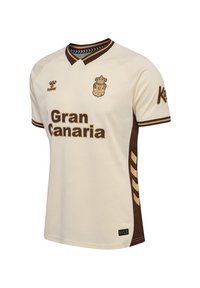 Cremfarbendes Fußballtrikot mit braunen Akzenten, V-Ausschnitt, Mesh-Struktur, "Gran Canaria" auf der Vorderseite gedruckt und seitlichem Chevron-Muster.