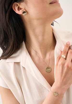 Saunier, Bague - gold-coloured