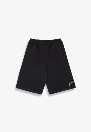 Zwarte shorts van zachte stof, met een elastische tailleband, zijzakken en een wit geborduurd logo op de linksonder rand.