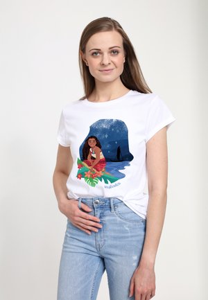T-shirt en coton blanc avec un graphique coloré d'une fille entourée de feuilles tropicales et de fleurs, texte « Wayfinder » en bas.