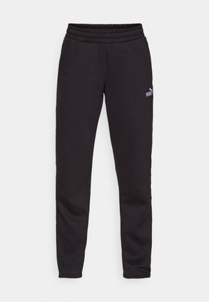Zwarte trainingsbroek met een geribbelde taille, tapered design en een klein wit Puma-logo aan de voorkant. Gemaakt van een zachte stof.