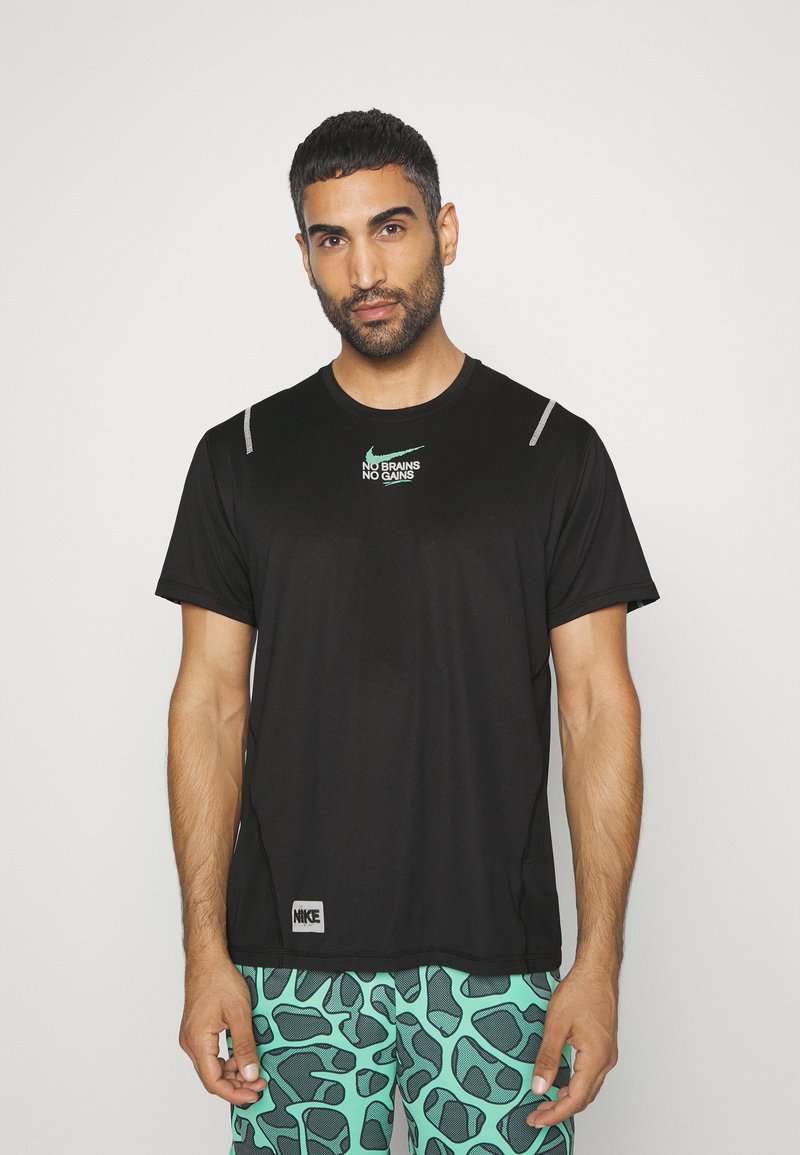 Nike Performance DRY DYE Sports Tshirt black/light menta/black Zalando.ie