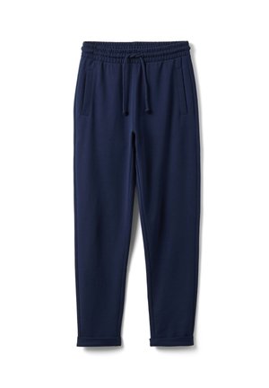 Pantalon jogger décontracté bleu marine avec taille élastique, cordon, poches latérales et ourlets côtelés sur fond blanc.