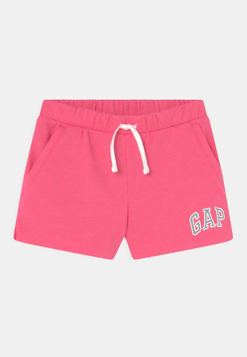 Shorts en coton rose avec taille élastique et cordon blanc, poches latérales et logo blanc "GAP" sur la jambe gauche.