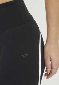 LEGEA NESO - Legging (type pantalon) - nero bianco