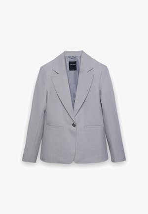 Blazer gris clair à un bouton, avec de larges revers et des poches avant, étiqueté taille petite.