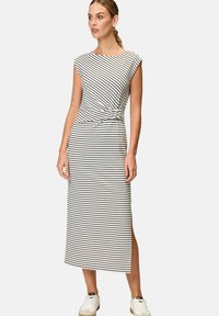 Striped midi dress with short sleeves, featuring a twist detail at the waist and a side slit; black and white color scheme.