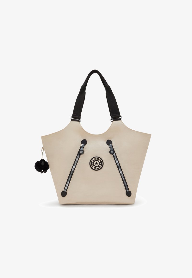 Borsa tote beige con doppi dettagli neri delle zip, manici neri e un logo rotondo. Dotata di un charm pom-pom nero attaccato. Texture liscia.