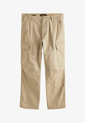 Beezid värvi cargo-püksid on valmistatud kergest kangast, nende külgedel on kaks taskut ja reie piirkonnas kaks taskut, sirged sääred ja õmblemise detailid.