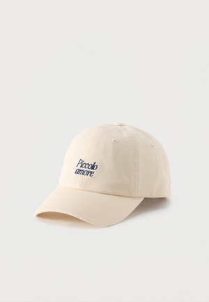Beige baseball cap with curved brim, featuring navy blue embroidered text "Piccolo amore" on front center.