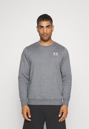 Grijze sweatshirt gemaakt van zachte stof, met een ronde hals, lange mouwen, geribbelde boorden en een klein wit logo op de borst.