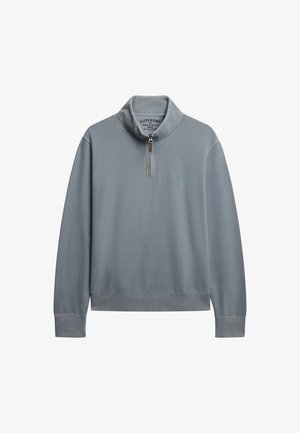 Pullover in zachtblauwe katoenmix, met een hoge kraag en een halve ritssluiting, geribbelde manchetten en een subtiele logo op de borst.